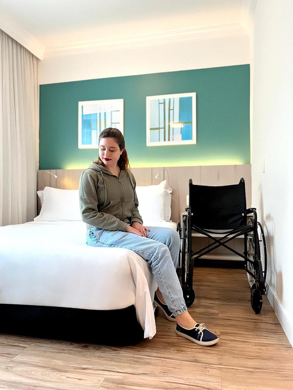 Radisson Oscar Freire Hotel Sao Paulo Exterior photo A disabled woman in a hotel room